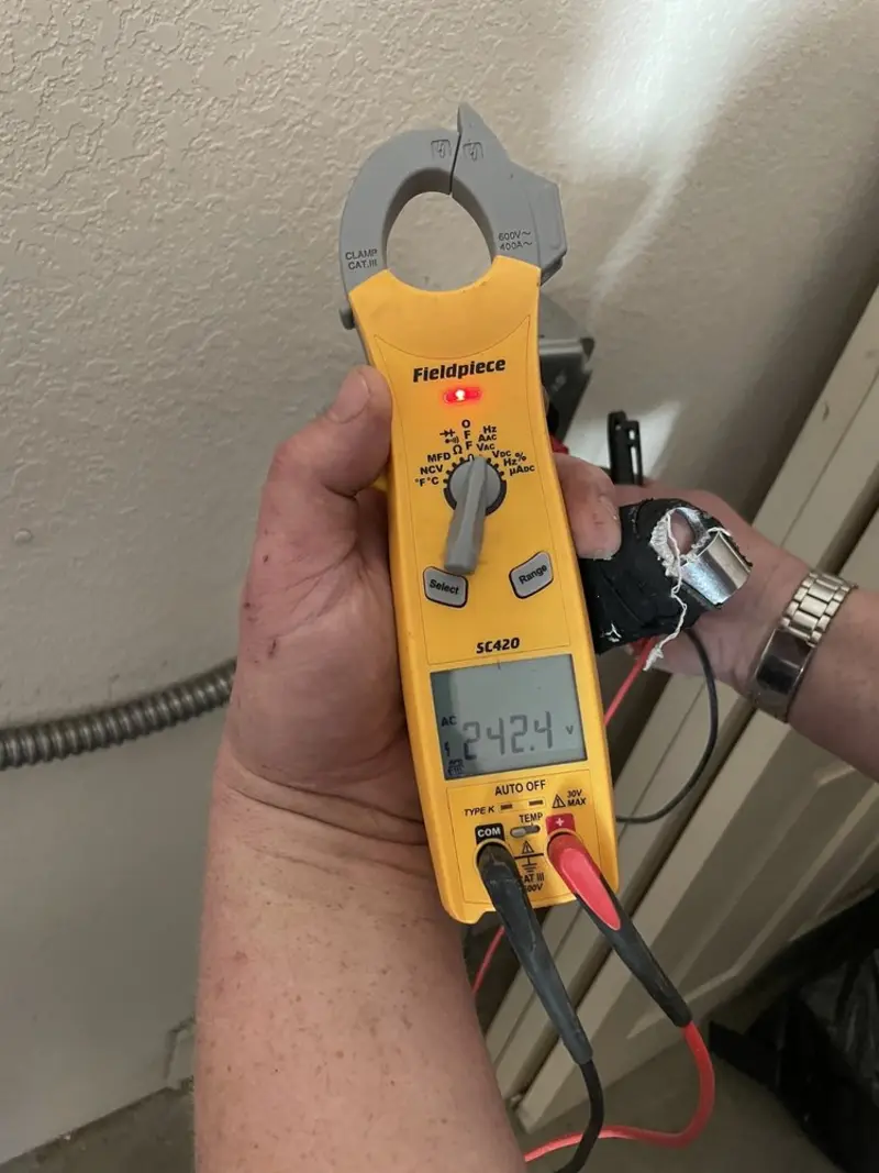 Voltage testing with clamp meter during Generator Installation in Union